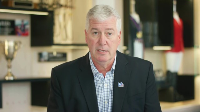 Tom O'Mara in a suit, facing the camera & speaking