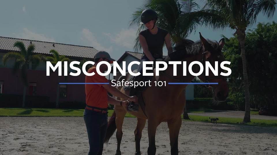 'Misconceptions' heading over trainer with a mounted rider, outdoors